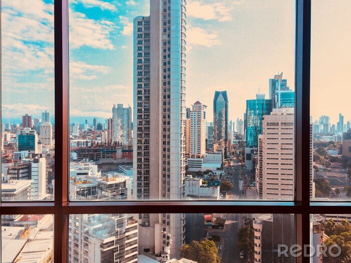 Canvas uitzicht vanuit wolkenkrabber venster op de skyline van de moderne stad