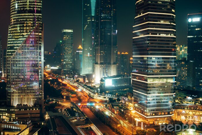 Canvas Verkeerslichten, Wolkenkrabbers in Shanghai stad in bij nacht