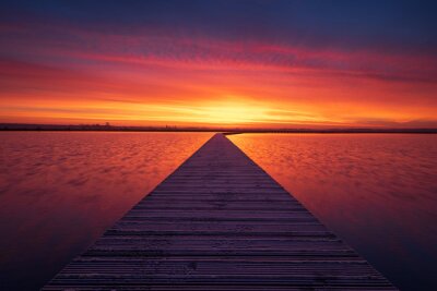 Canvas Very colorful and tranquil dawn at a jetty in a lake. Groningen, Holland.