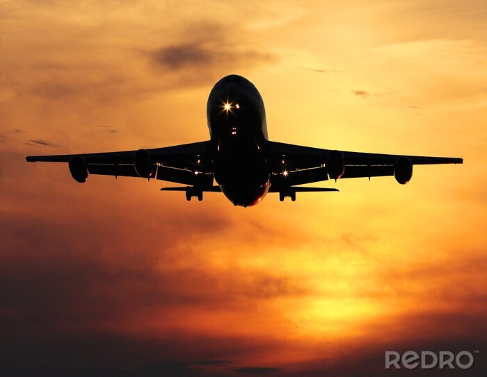 Canvas vliegtuig landing bij zonsondergang, close-up