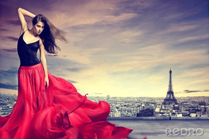 Canvas Vrouw op de achtergrond van de skyline van Parijs