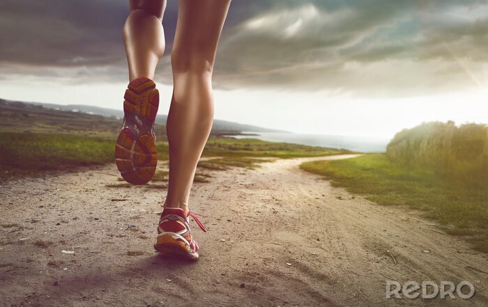Canvas Vrouwelijke Jogger op de Coastal Path
