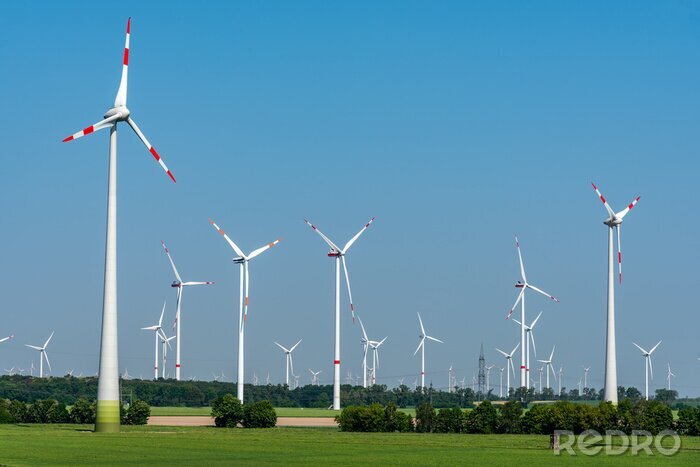 Canvas Windenergiegeneratoren in een wijd open landschap in Duitsland