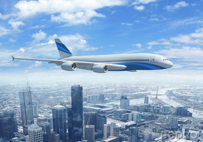 Canvas Wit passagiersvliegtuig vliegen boven een stad