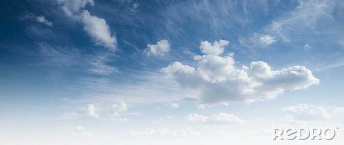 Canvas Witte wolken aan een blauwe lucht