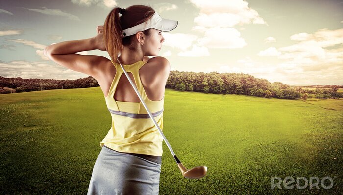 Canvas Young female in sportswear playing golf on green field