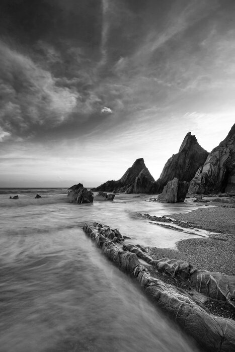 Canvas Zandstrand met rotsen