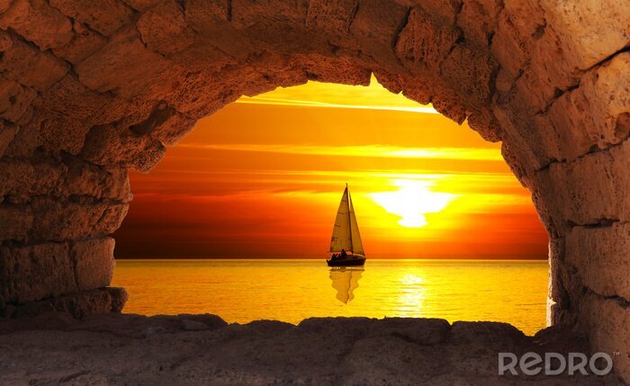 Canvas Zeilboot in de ondergaande zon