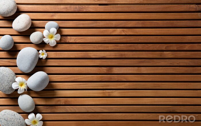 Canvas zen kiezels en spa bloemen op hamam houten plank