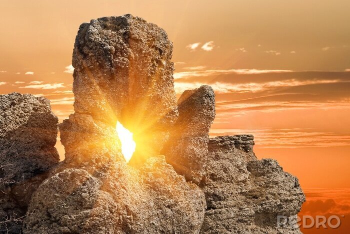 Canvas Zon tussen de rotsen