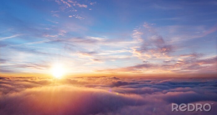 Canvas Zonsondergang in de wolken