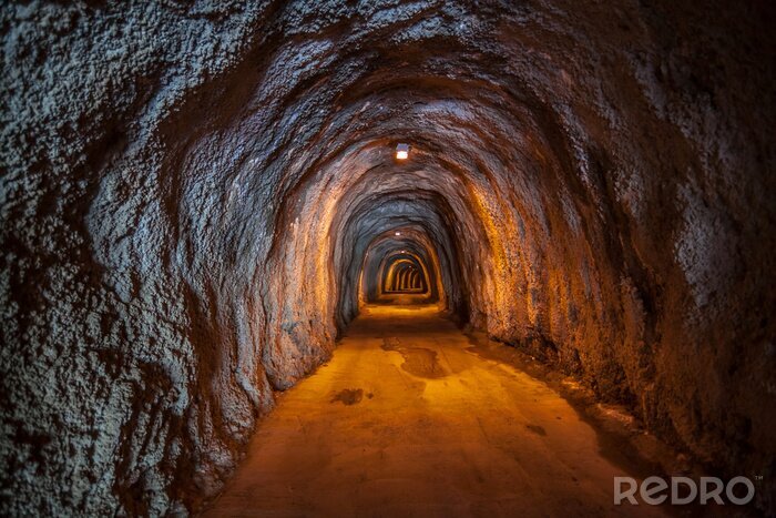 Fotobehang 3D tunnel in de rotsen