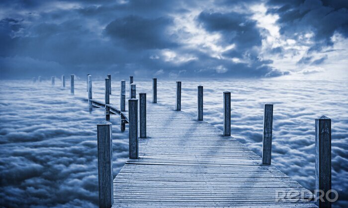 Fotobehang Abstracte pier tussen de wolken