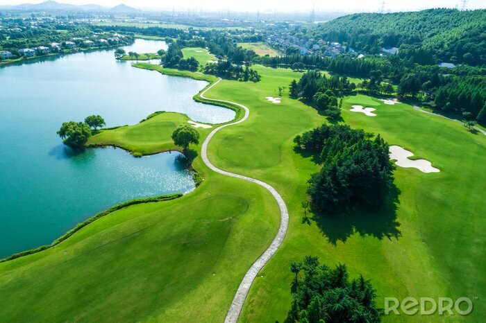 Fotobehang Aerial view of golf course and water