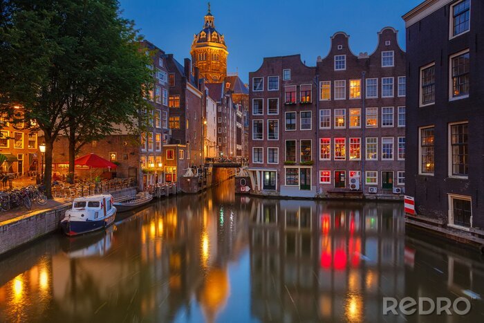 Fotobehang Amsterdam 's avonds verlicht