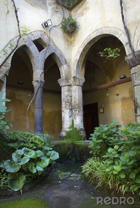 Fotobehang Arches and Columns of the Cloisters in Sorrento, Italy.