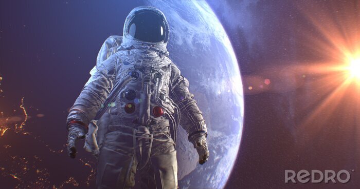 Fotobehang Astronaut met achtergrond van de zon