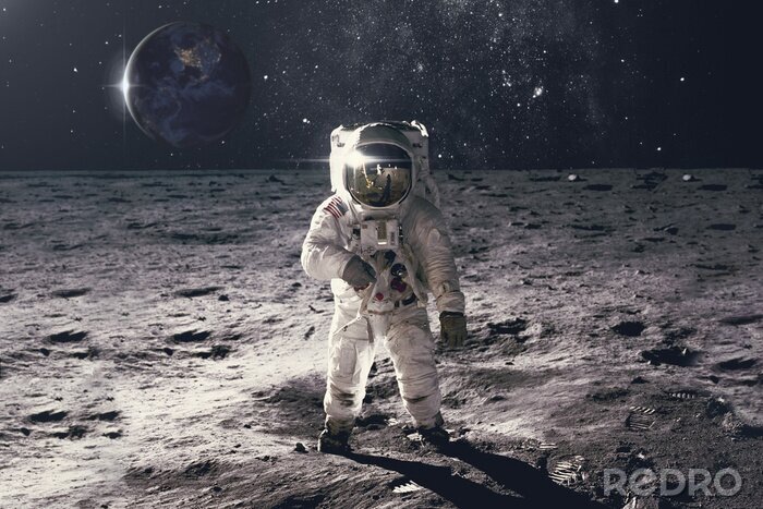 Fotobehang Astronaut op een rotsachtig oppervlak
