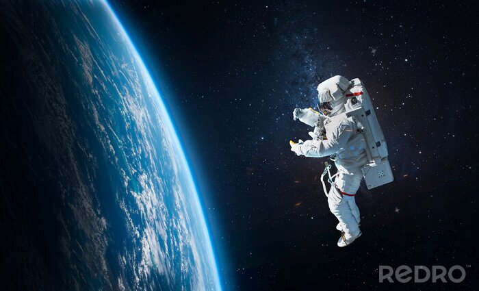 Fotobehang Astronaut ruimte blauwe wereldbol