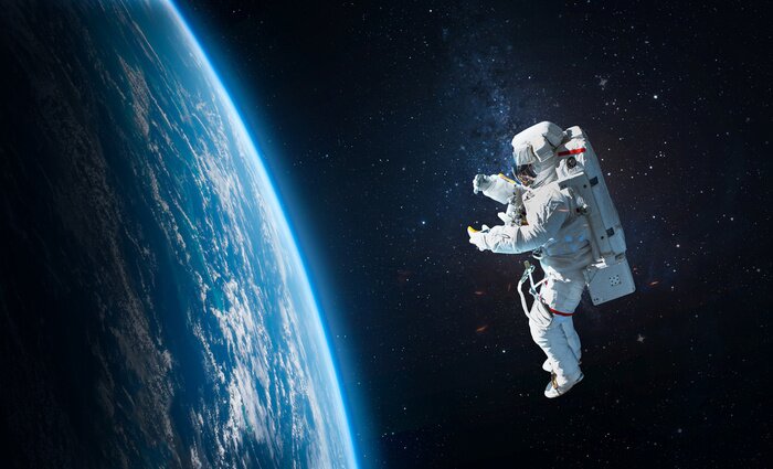 Fotobehang Astronaut ruimte blauwe wereldbol