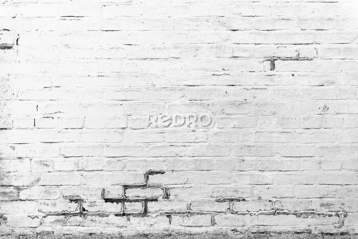 Fotobehang Bakstenen muur met krassen