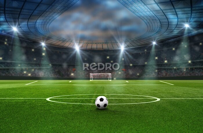 Fotobehang Bal op het groene gras van het voetbalstadion