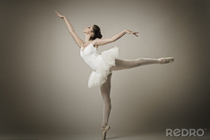 Fotobehang Ballerina op crèmekleurige achtergrond
