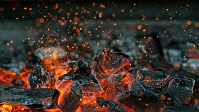 Fotobehang Barbecue Grill Pit With Glowing And Flaming Hot Charcoal Briquettes, Close-Up