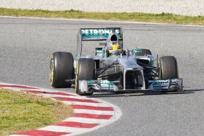Fotobehang BARCELONA - MARCH 2: Lewis Hamilton racing with his new Mercedes W04 at Formula One Teams Test Days at Catalunya circuit on March 2, 2013 in Montmelo, Barcelona, Spain
