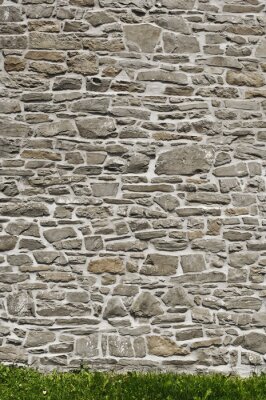 Fotobehang Beige-grijze stenen muur
