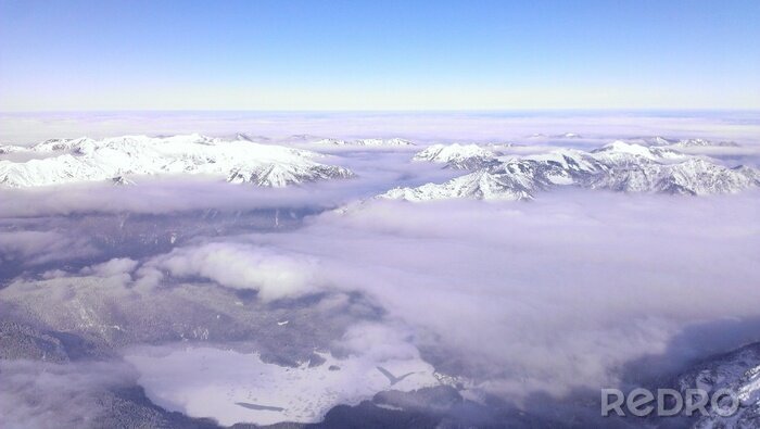 Fotobehang Bergen en hemelsblauwe lucht