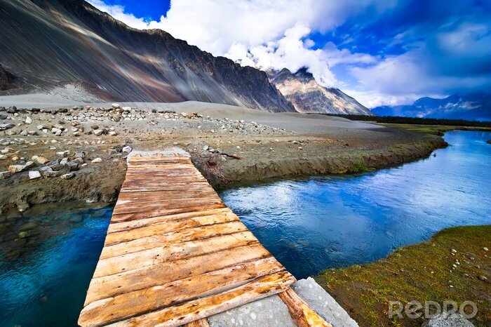 Fotobehang Berglandschap met blauwe hemel