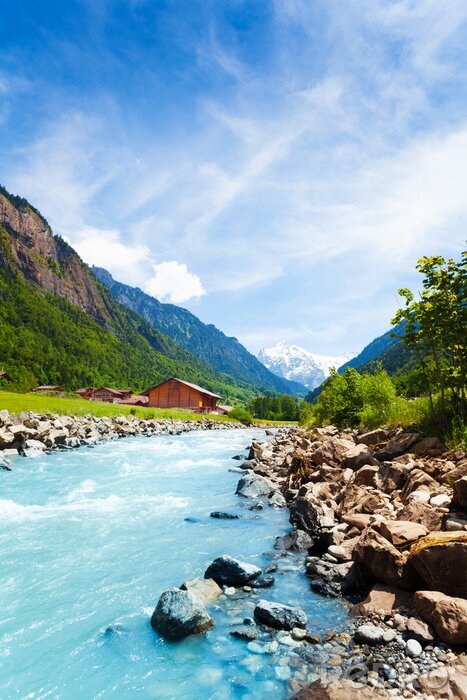 Fotobehang Berglandschap met een riviertje