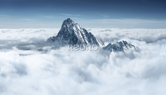 Fotobehang Bergtoppen in de wolken