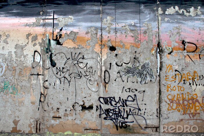 Fotobehang Betonnen muur met kleurrijke graffiti