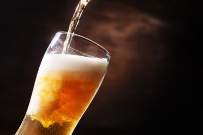Fotobehang Bier geschonken in een glas
