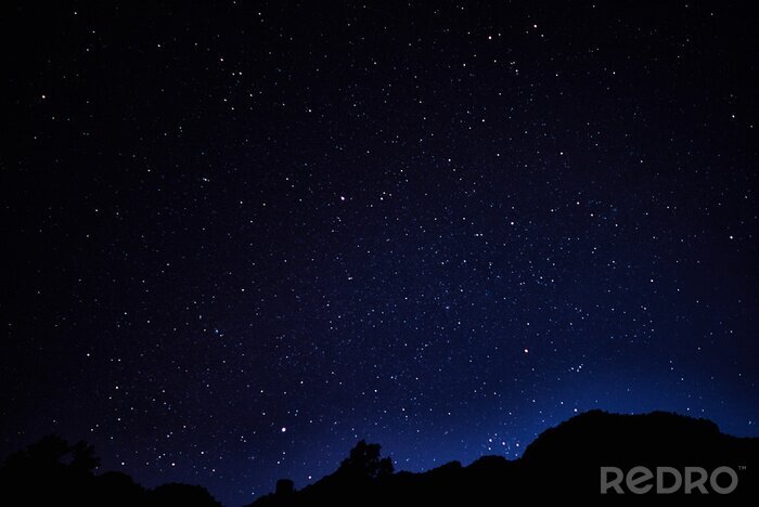 Fotobehang Blauwe hemel met sterren