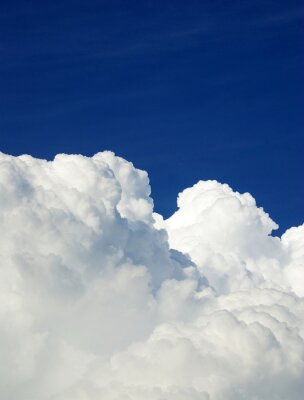 Fotobehang Blauwe lucht met stapelwolken