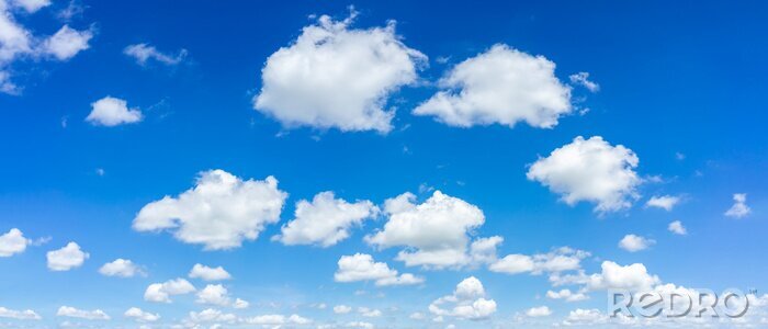 Fotobehang Blauwe lucht, witte wolken