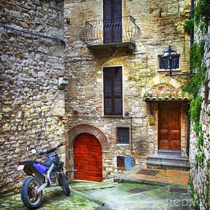 Fotobehang Blauwe scooter op een stenen binnenplaats