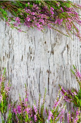Fotobehang Bloemen op lichtgekleurd hout