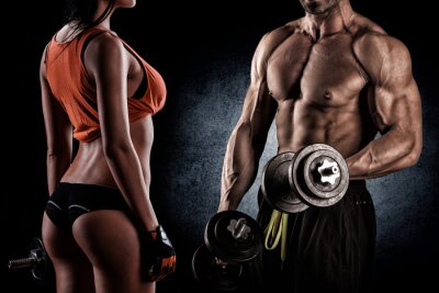Fotobehang Bodybuilders trainen met gewichten