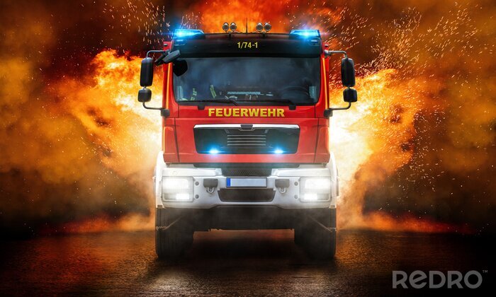 Fotobehang Brandweerwagen tegen een achtergrond van vlammen