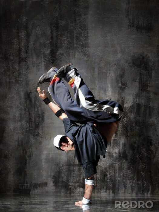 Fotobehang Breakdance op de achtergrond van beton