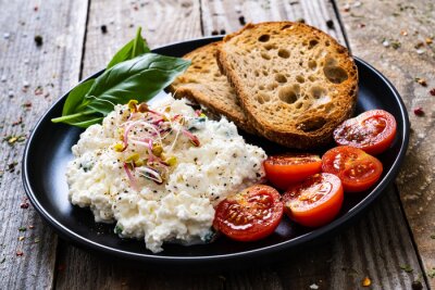 Fotobehang Breakfast - cottage cheese, toasts and vegetables

