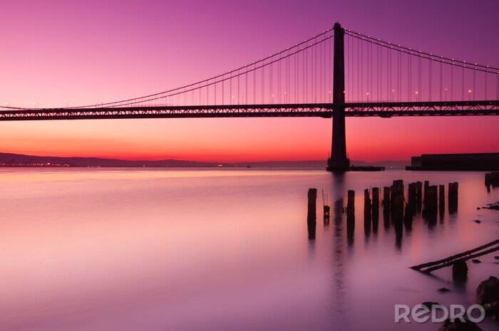 Fotobehang Californië en zonsondergang over de Bay Bridge
