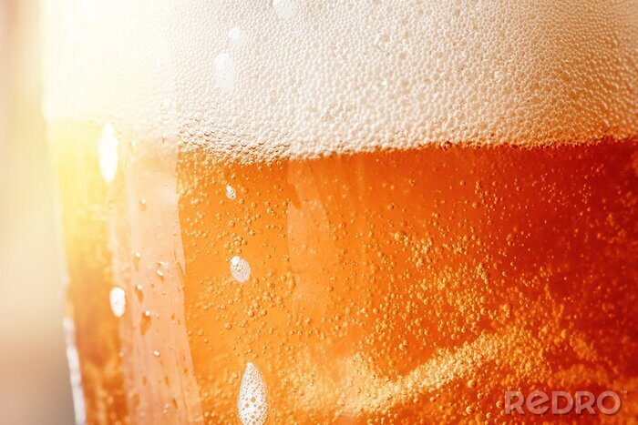 Fotobehang Close-up van bier in een glas