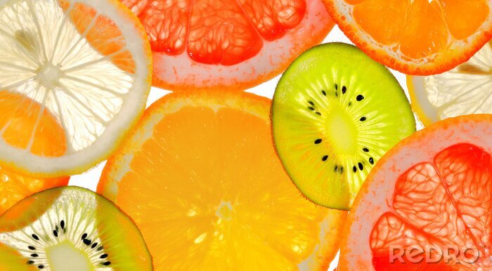 Fotobehang Close-up van plakjes gesneden fruit