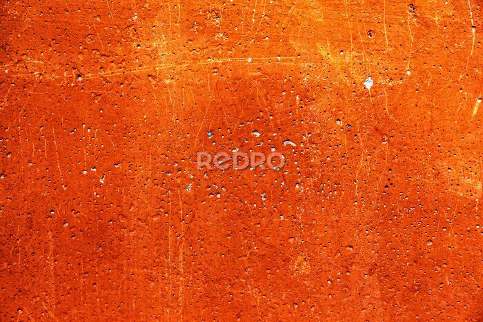 Fotobehang Concrete textuur in oranje kleuren