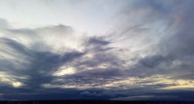 Fotobehang Dark clouds in the evening - cloudy sunset